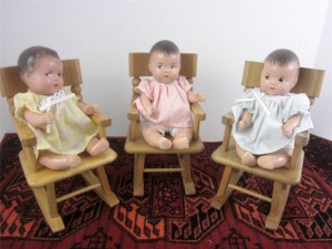 three dolls